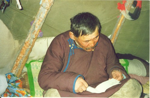 Man reading Gospel tract